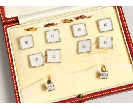 A SET OF 18CT WHITE GOLD, MOTHER-OF-PEARL AND DIAMOND CUFFLINKS AND STUDS from Harrods &amp; Son, in a leather case.