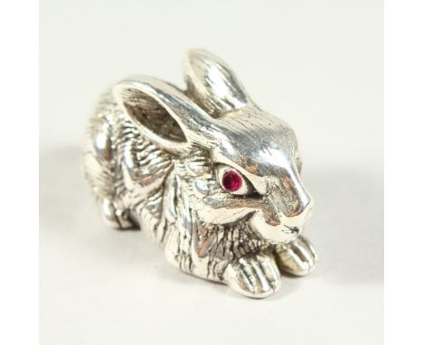 A NOVELTY RABBIT with ruby eyes. 5cms long.
