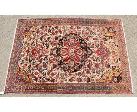 A VERY FINE AND RARE ANTIQUE 19TH CENTURY PERSIAN QASHQAI CARPET, with an allover floral pattern and border. 9ft 8ins x 6ft 1