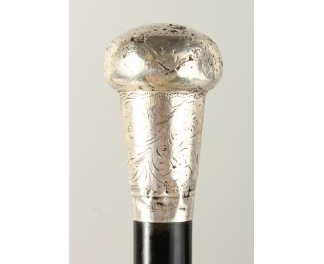 AN EARLY 20TH CENTURY WALKING STICK with engraved silver handle. 92cms long.