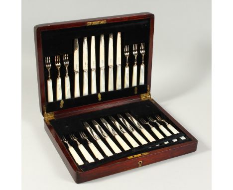 A GOOD SET OF TWENTY-FOUR DESSERT KNIVES AND FORKS with mother-of-pearl handles, in a canteen. London 1927.