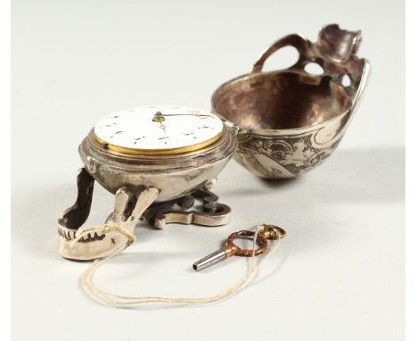 A RARE SILVER SKULL WATCH engraved with a classical female and opening to reveal a verge watch movement by HERBINET. 3cms lon