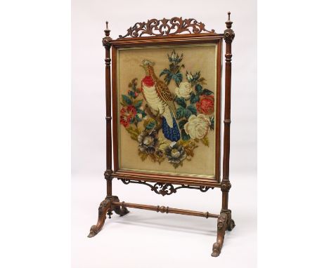 A VICTORIAN MAHOGANY FRAMED FIRESCREEN, with beadwork and woolwork panel depicting a bird on a branch. 138cms high x 88cms wi