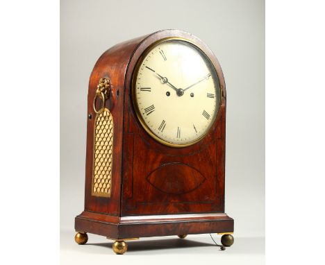 A REGENCY MAHOGANY BRACKET CLOCK, with domed top, brass grilled sides, lion ring handle, eight-day movement, strike action wi