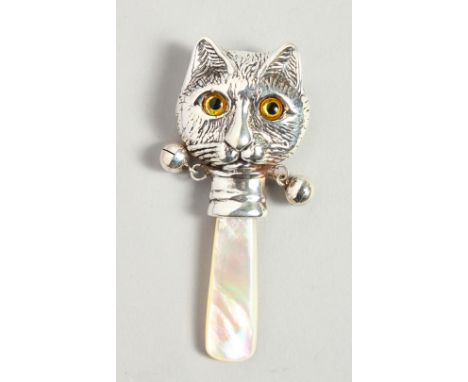 A NOVELTY SILVER AND MOTHER-OF-PEARL BABY'S RATTLE with a cat face.