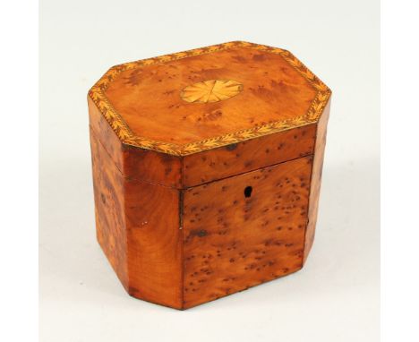 A GEORGE III YEW WOOD TEA CADDY, with fan and herringbone inlay. 11cms high.