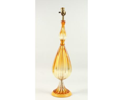 A LARGE UNUSUAL MOTTLED GLASS LAMP fitted for electricity. 2ft 5ins high.