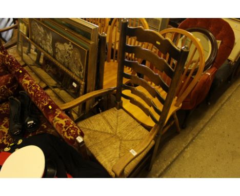 Six oak and rush seated ladder back dining chairs to include two carvers 