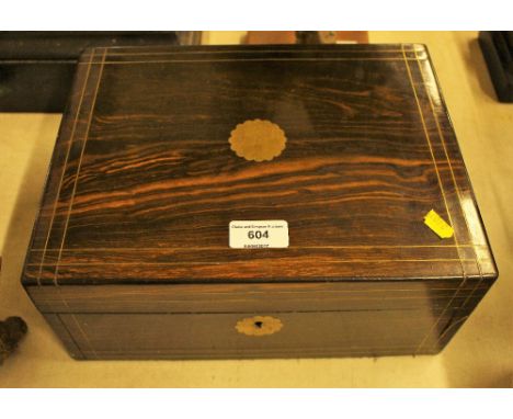 A Victorian coromandel and brass inlaid trinket box 