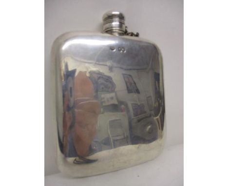 A Victorian hip flask by William Summers, London 1864 of curved, rectangular, cushion form with a screw cap and safety chain,