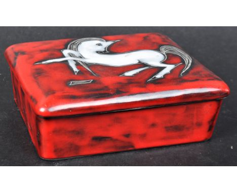 A retro mid 20th Century Italian studio art ceramic trinket box having a stylized horse atop the lid opening to reveal a holl