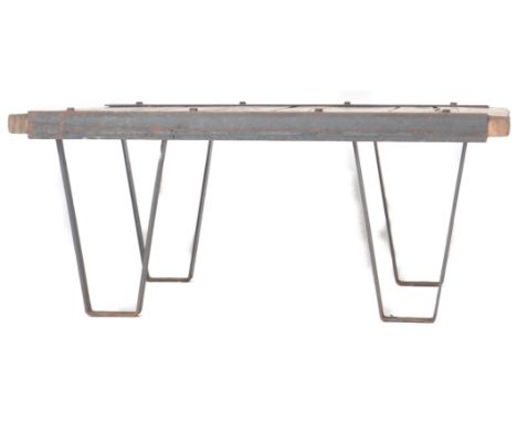 A contemporary handmade coffee table / low table of simple rectangular form having an oak plank top with iron bound sides. Ra