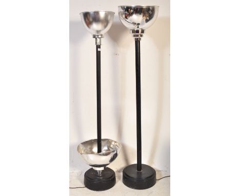A pair of mid Century Art Deco influenced uplighters / standard lamp lights with each having reverse chrome bell pendant shad