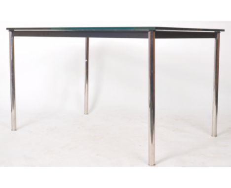 Manner of Le Corbusier - LC10 -&nbsp; A contemporary designer chrome and glass topped dining table / desk having an ebonised 
