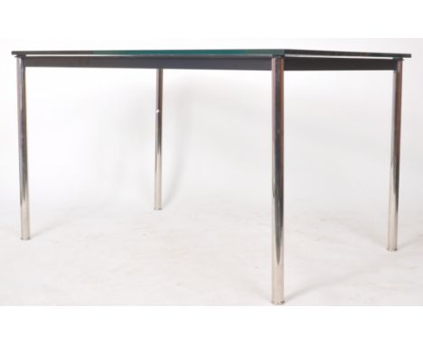 Manner of Le Corbusier - LC10 -&nbsp; A contemporary designer chrome and glass topped dining table / desk having an ebonised 