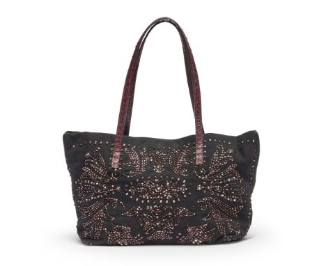 in black suedewith burgundy-toned bugle bead embroidery, python-like leather handles.  Minor flaws.
