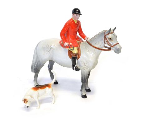 Beswick Huntsman and hound Beswick figure 1501 of a Huntsman on a grey horse and one fox houndBoth in good condition with no 