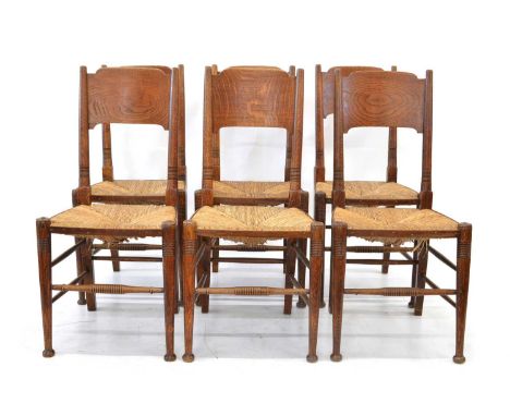 Six William Birch Dining Chairs Six William Birch of High Wycombe, Arts &amp; Crafts oak dining chairs with shaped panel back