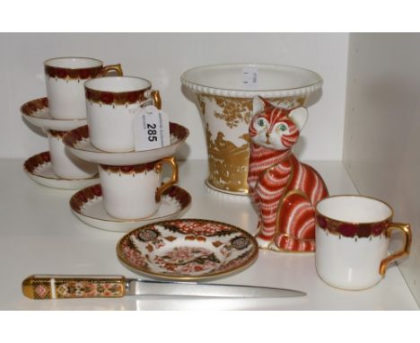 A Royal Crown Derby five setting part coffee set; a Royal Crown Derby 383 Imari pattern trinket dish; a Gold Aves pattern pla