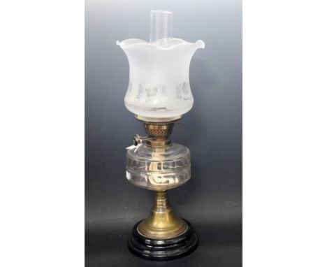 A Victorian oil lamp, cut glass reservoir, etched shade, approx 55cm high overall