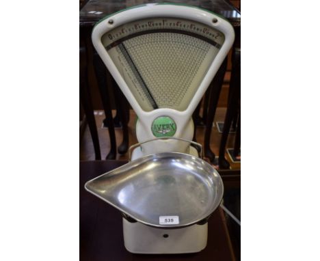 A set of vintage Avery 0-1lb scales, white enamel body