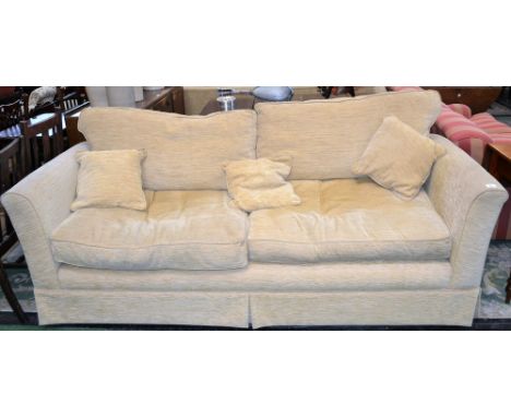 A modern designer three seat sofa, 227cm wide