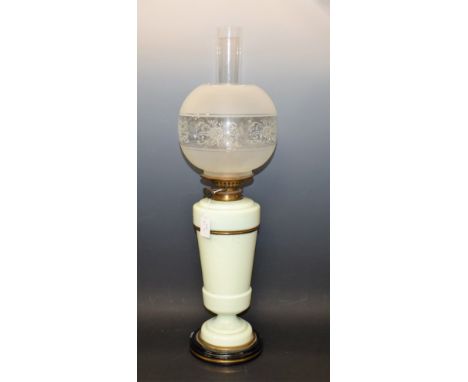 A Victorian oil lamp, pale mint green reservoir and base, etched glass shade, approx 67cm high overall