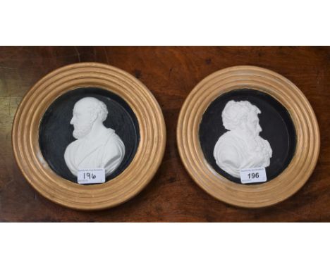 A pair of 19th century plaster portrait plaques, of Renaissance gentlemen, bust length in profile, 14.5cm diam, moulded frame