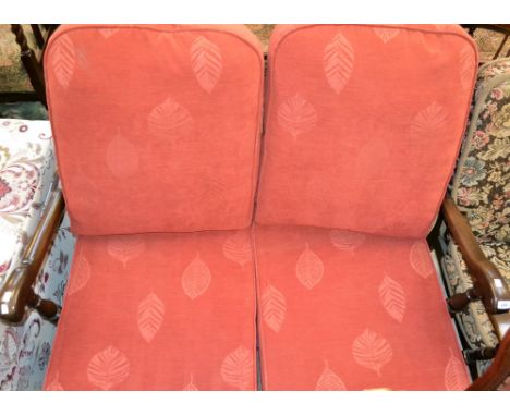 An Ercol Old Colonial two seater bench