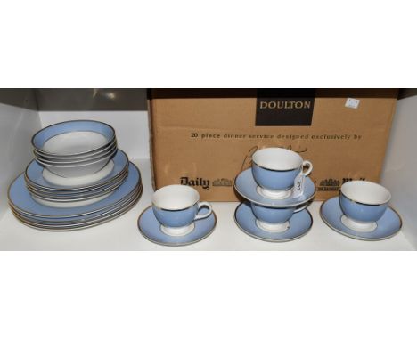 A Royal Doulton dinner service, for four, powder blue band on white, designed exclusively for The Daily Mail on Sunday, compr