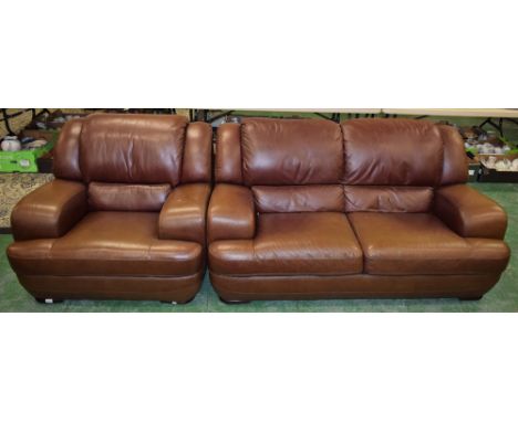 A modern brown leather two seater sofa; a conforming armchair (2)