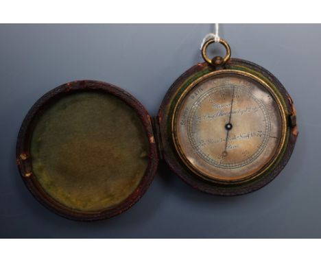 A 19th century French gilt brass aneroid pocket barometer, 4.5cm silvered register inscribed Maison de Chevalier Optician. Pl