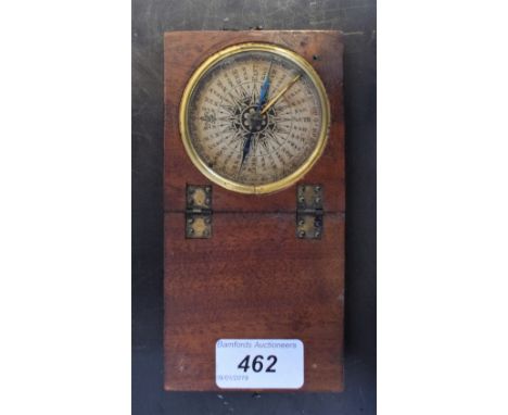A 19th century mahogany travelling compass, 6cm dial, blued steel needle, hinged cover, 8cm wide