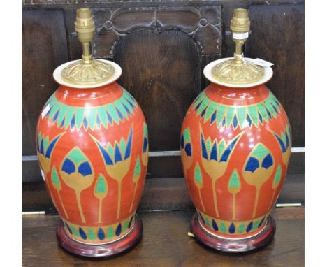A pair of Rochamp vintage lamps, Egyptian Revival, brass mounted, turned wooden bases