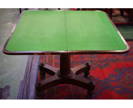 A 19th century style card table, the hinged top enclosing a lined playing surface, 92cm wide