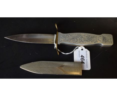 A dagger, 12cm blade, brass cross-guard, the grip bright-cut engraved,  23.5cm long overall