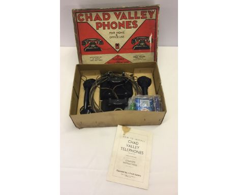 A Chad Valley telephones set in original box.  