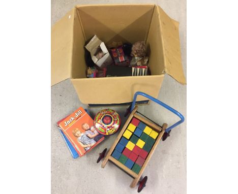 A box of vintage toys & games to include push-along bricks, and a Chad Valley tinplate top.  