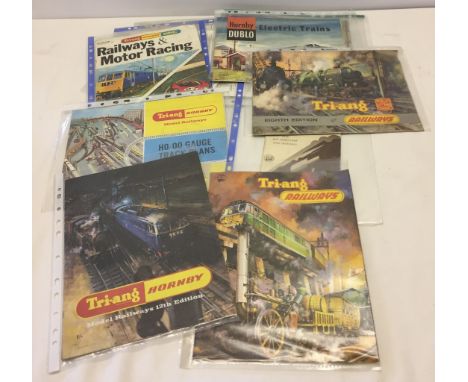 A collection of approx 17 assorted vintage model railway catalogues and leaflets. To include Tri-ang and Hornby. 