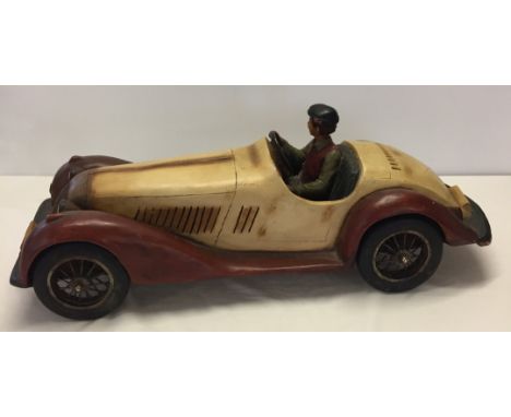 A very large scale model of a vintage racing car with driver, measures approx 71cm long.  