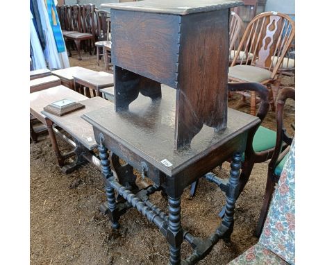 An oak side table, with a single frieze drawer, on bobbin turned supports, 58 cm wide, a coffer of small proportions, 46 cm w