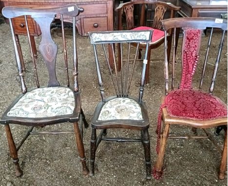 Three single chairs, a pair of floral encrusted vases, a print, an occasional table, a lamp, a bedside table, three rugs, and
