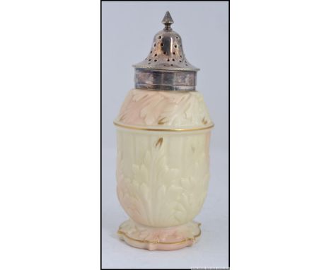A Locke & Co Worcester sugar caster having a silver plated  finial topped cover with  circular pieced apertures and foliate m