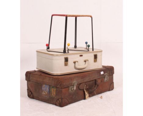 A good leather early 20th century suitcase together with a white vinyl 1950's suitcase by Airport. Also a sputnik / atomic co