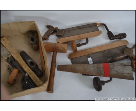 A collection of vintage woodworking tools to include Braces, Mitre Saws, miniature planes etc, please see images