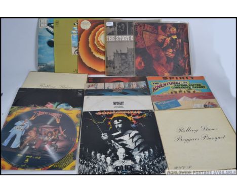 A collection of vinyl long play records to include Wizzard Brew, Eno - Here Come The Warm Jets, Tommy The Who, Sprit x 3 Twel