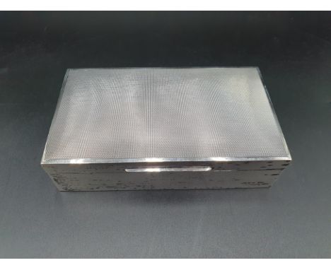 A George VI silver Cigarette Box with engine turning, Birmingham 1938, 16 x 9cms 