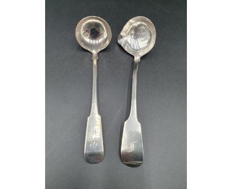A George IV Irish silver Sauce Ladle fiddle pattern with pouring lip and engraved initial F, Dublin 1829, and a Scottish Sauc