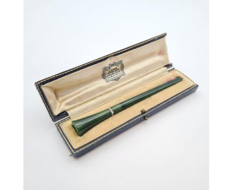 A 1930's Nephrite Jade and Diamond Cheroot/Cigarette Holder millegrain-set a row of eight-cut diamonds, approx 11.50cms long,