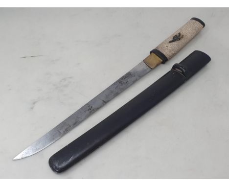A Japanese Tanto, signed Kuni Yoshi, mid to late Edo Period with shagreen grip and ebonised scabbard, 17 1/2in L overall, edg